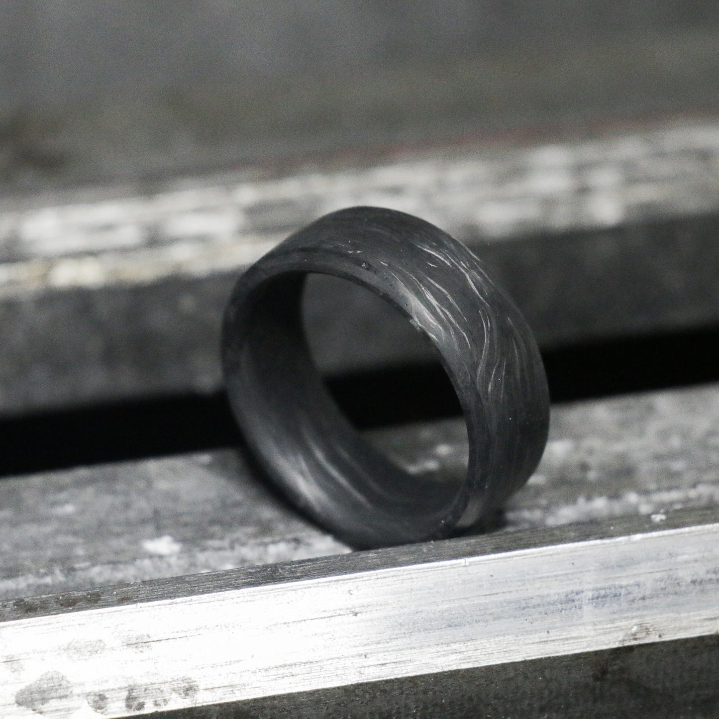 Forged carbon fiber band