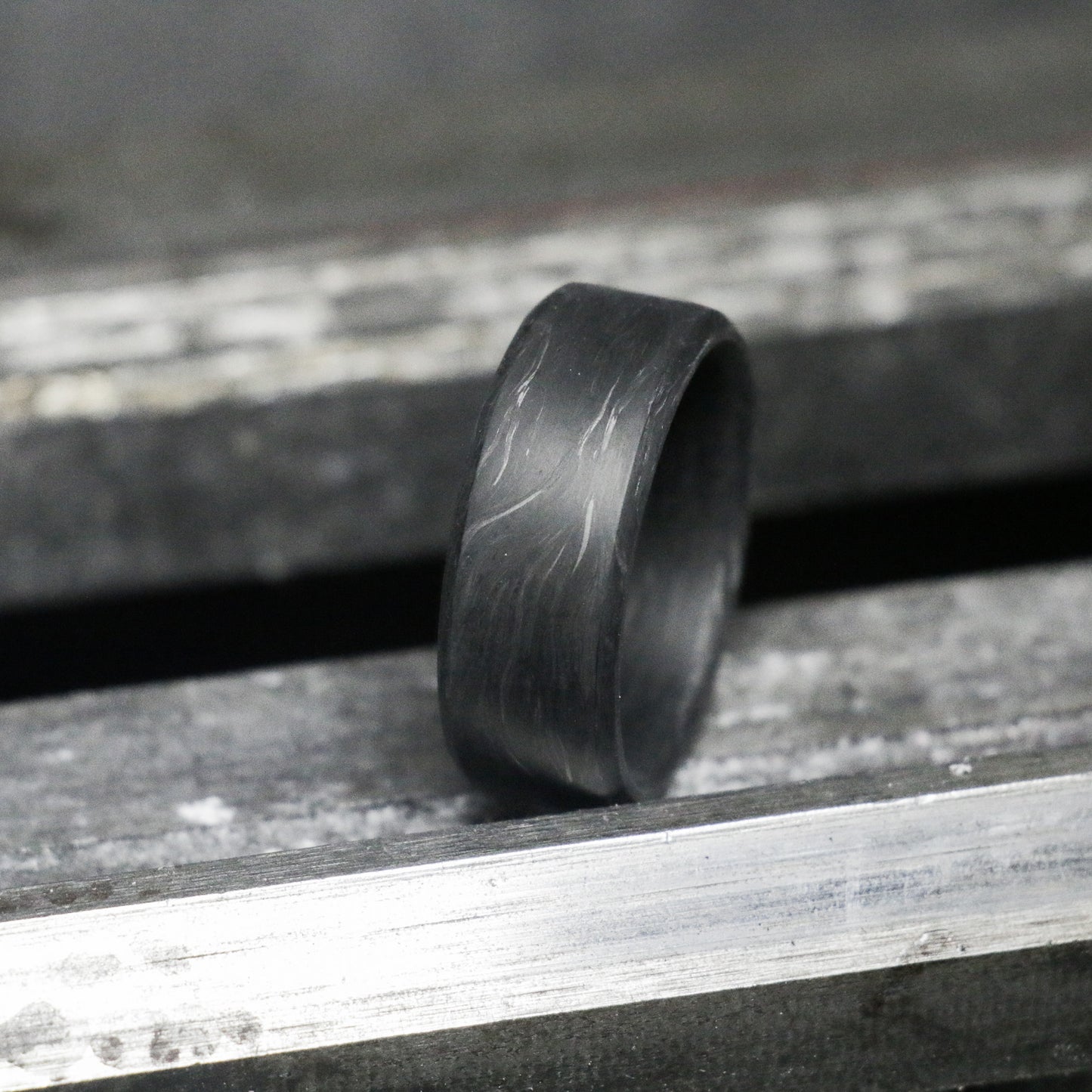 Forged carbon fiber band